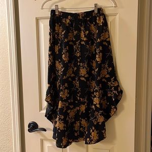 Sheln black floral skirt with button detail.  Size S.